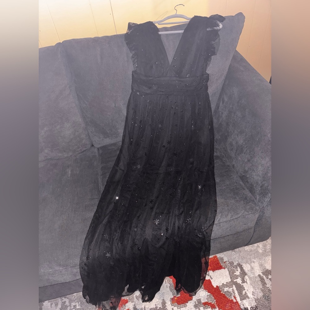 Soieblu Black Maxi Dress with Star details 
Free clutch (picture included)